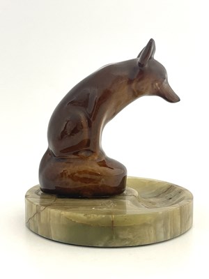 Lot 813 - A Royal Doulton Kingsware figure ashtray,...