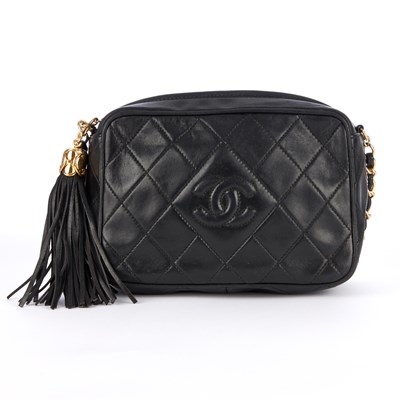 Lot 257 - Chanel, a vintage Tassel camera bag, designed...