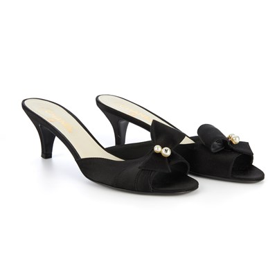 Lot 270 - Chanel, a pair of black satin kitten heels,...