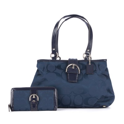 Lot 283 - Coach, a blue Soho Signature handbag with...