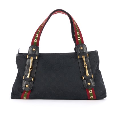 Lot 310 - Gucci, a black GG Web handbag, crafted from...