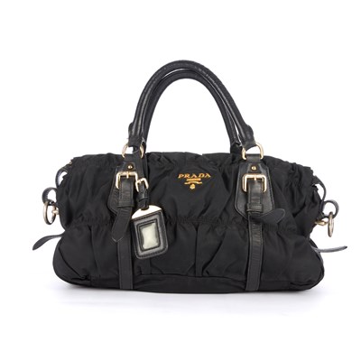 Lot 385 - Prada, a black nylon ruched handbag, featuring...