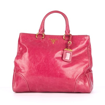 Lot 389 - Prada, a pink Vitello handbag, crafted from...