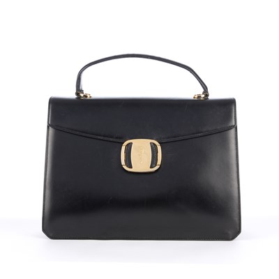 Lot 399 - Salvatore Ferragamo, a black leather handbag,...