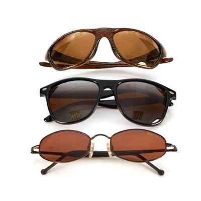 Lot 407 - Three pairs of sunglasses, to include a pair...