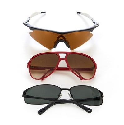 Lot 408 - Three pairs of sunglasses, to include a pair...