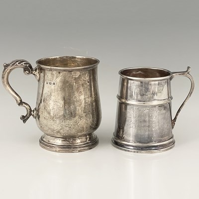 Lot 319 - A George V silver mug, of baluster form, atop...