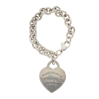 Lot 104 - Tiffany & Co., a large silver Return to Tiffany Heart Tag charm bracelet