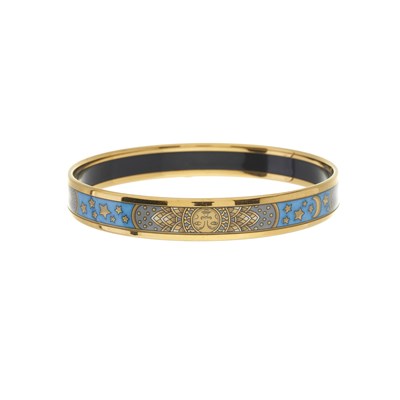 Lot 371 - Hermes, an enamel bangle, featuring the sun,...