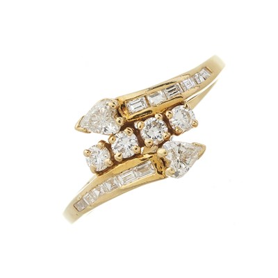 Lot 184 - An 18ct gold vari-cut diamond crossover dress ring