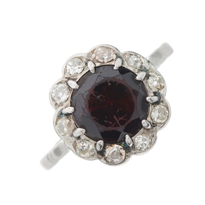 Lot 19 - A mid 20th century circular-shape garnet and...