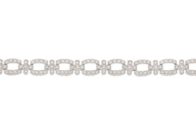 Lot 29 - An 18ct gold pave-set diamond fancy-link...