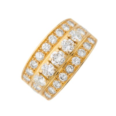 Lot 37 - An 18ct gold brilliant-cut diamond three-row...