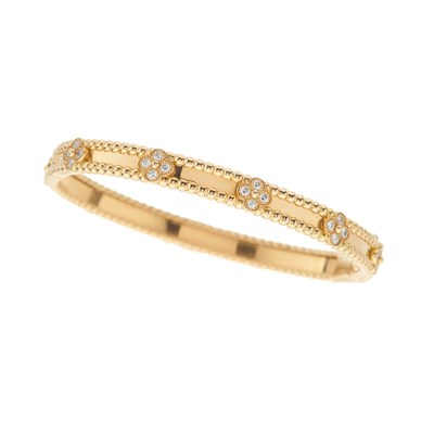 Lot 62 - Van Cleef & Arpels, an 18ct gold diamond...