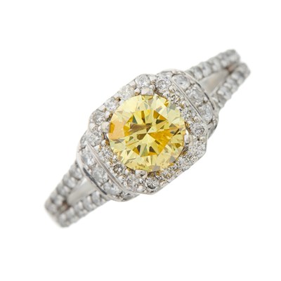 Lot 91 - A 14ct gold Fancy Vivid Yellow diamond...