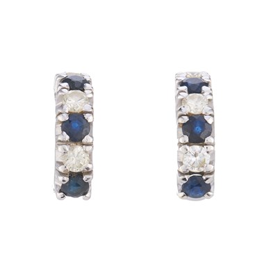 Lot 111 - A pair of alternating circular-shape sapphire...