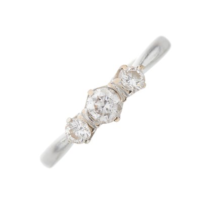 Lot 123 - An 18ct gold brilliant-cut diamond three-stone...
