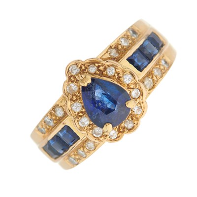 Lot 130 - An 18ct gold pear-shape sapphire and brilliant-...