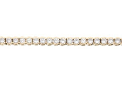 Lot 155 - A 14ct gold brilliant-cut diamond line...