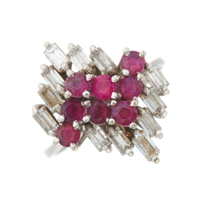 Lot 159 - A 1970s 18ct gold circular-shape ruby and...