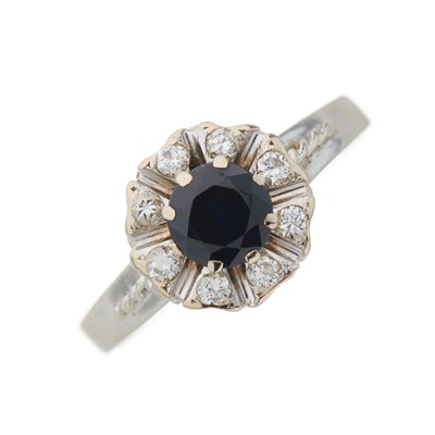 Lot 161 - An 18ct gold circular-shape sapphire and...
