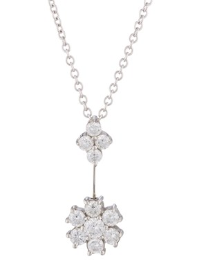 Lot 167 - An 18ct gold brilliant-cut diamond floral...