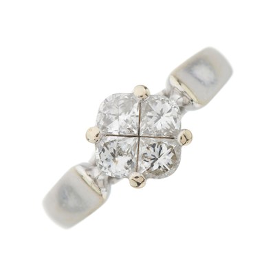 Lot 172 - An 18ct gold fancy-shape diamond cluster ring,...