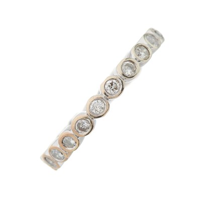 Lot 183 - A brilliant-cut diamond full eternity ring,...