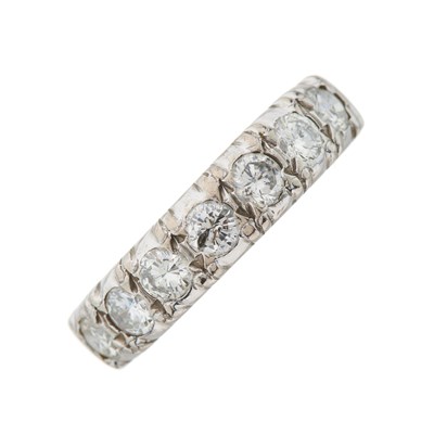 Lot 186 - An 18ct gold brilliant-cut diamond half...