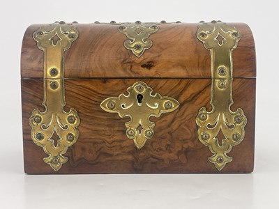 Lot 594 - A mid Victorian figured walnut tea caddy,...