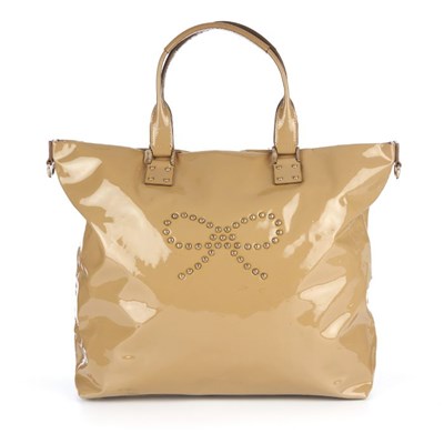 Lot 239 - Anya Hindmarch, a beige patent leather handbag,...