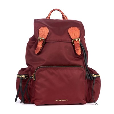 Lot 250 - Burberry, a red nylon backpack, featuring...