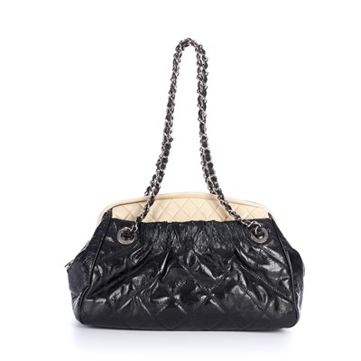 Lot 274 - Chanel, a two-tone Logo Zip Charm shoulder bag,...