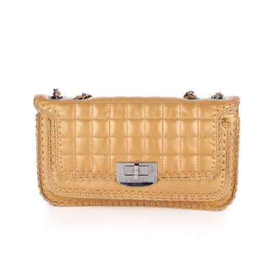 Lot 283 - Chanel, a gold leather Reissue Flap handbag,...