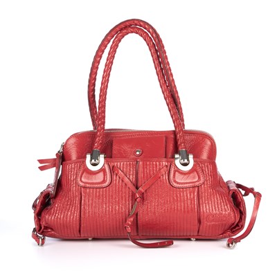 Lot 288 - Chloe, a red patent leather handbag, featuring...