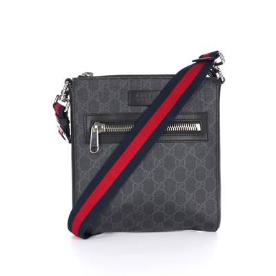 Lot 308 - Gucci, a black Supreme messenger bag, crafted...
