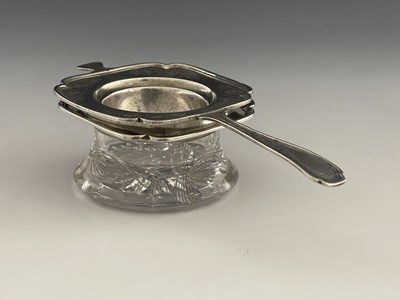 Lot 16 - An American sterling silver tea strainer and...