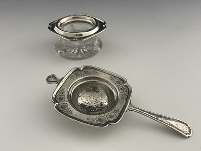 Lot 16 - An American sterling silver tea strainer and...